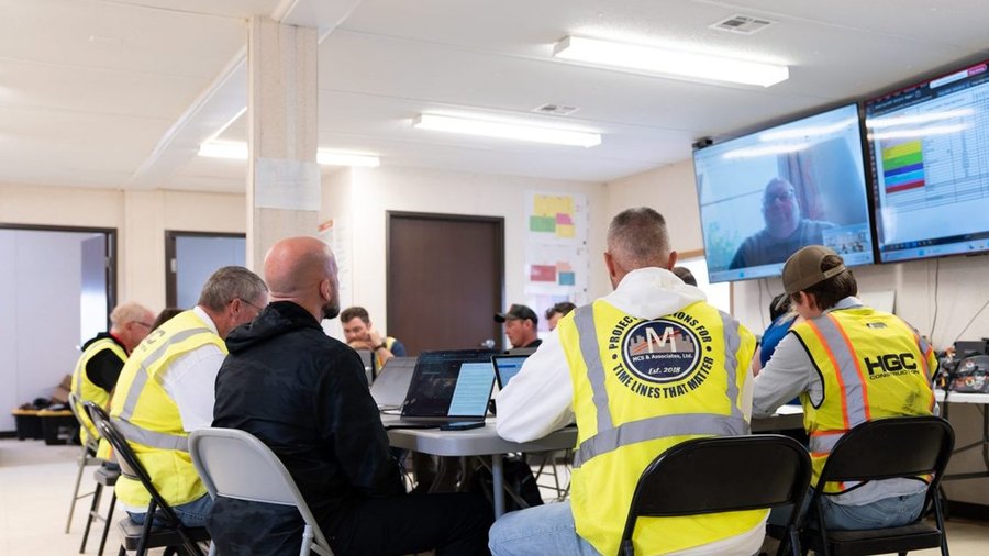 MCS project manager in an owner-architect-contractor budget meeting